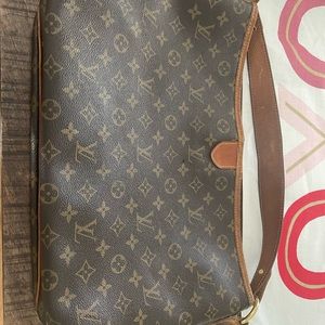 Louis Vuitton Bag- very used. Originally 1,500$.
